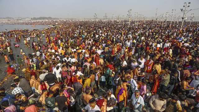 Prayagraj: Devotees take a holy dip in the Ganga river during the ongoing Maha Kumbh Mela festival, in Prayagraj, Wednesday, Feb. 19, 2025. (PTI Photo) 