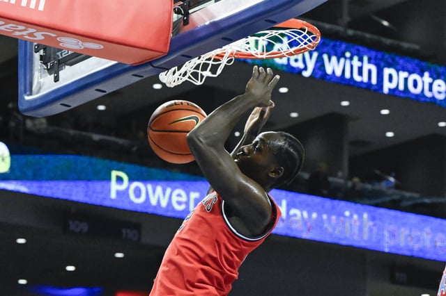 Feb 19, 2025; Chicago, Illinois, USA;  St. John's Red Storm forward Sadiku Ibine Ayo (2) dunks the ball against DePaul Blue Demons  during the first half at Wintrust Arena. Mandatory Credit: Matt Marton-Imagn Images