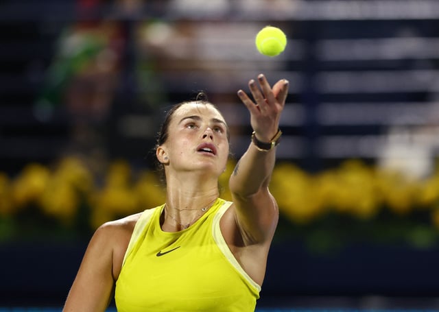 Tennis - Dubai Championships - Dubai Tennis Stadium, Dubai, United Arab Emirates - February 19, 2025 Belarus' Aryna Sabalenka in action during her round of 16 match against Denmark's Clara Tauson REUTERS/Amr Alfiky