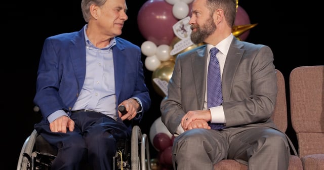 Gov. Greg Abbott speaks with Texas House Speaker Dustin Burrows, during ‘Parent Empowerment Night’ at San Antonio Christian School, in San Antonio, Texas, on February, 17, 2025.  The governor has made the polarizing school voucher bill, Senate Bill 2,  a top priority for this year’s legislative session.