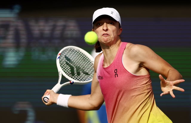 Tennis - Dubai Championships - Dubai Tennis Stadium, Dubai, United Arab Emirates - February 20, 2025 Poland's Iga Swiatek in action during her quarter final match against Russia's Mirra Andreeva REUTERS/Amr Alfiky