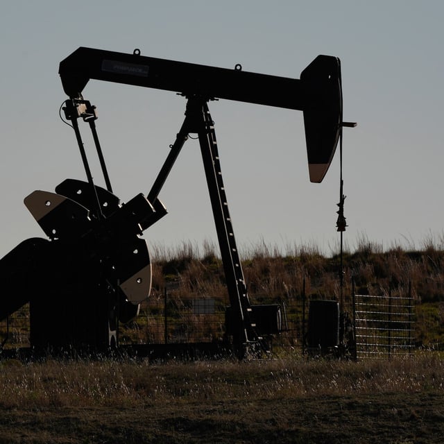 Pumpjacks operate in a pasture, Monday, Sept. 30, 2024, near Hays, Kan. (AP Photo/Charlie Riedel)