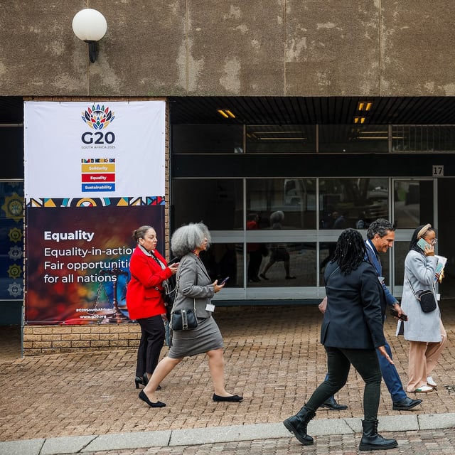 Delegates walk to the venue ahead of the G20 Foreign Minister Meeting at the Nasrec Expo Centre in Johannesburg on February 20, 2025. Top diplomats from the Group of 20 major economies will convene in South Africa on February 20, 2025 for a meeting dominated by a packed global agenda but overshadowed by a snub by the top US envoy.
As a curtain-raiser to the G20 summit in November, the foreign ministers will gather for talks over two days, held for the first time in Africa. (Photo by PHILL MAGAKOE / AFP) (Photo by PHILL MAGAKOE/AFP via Getty Images)