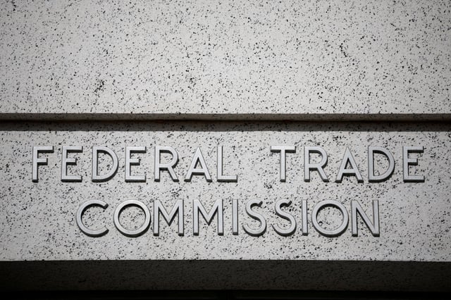 A view of signage at the Federal Trade Commission (FTC) headquarters in Washington, D.C., U.S., November 24, 2024. REUTERS/Benoit Tessier/File Photo