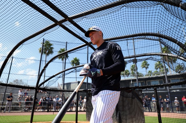 Aaron Judge #99 of the New York Yankees looks on during spring training at George M. Steinbrenner Field on February 18, 2025 in Tampa, Florida.
