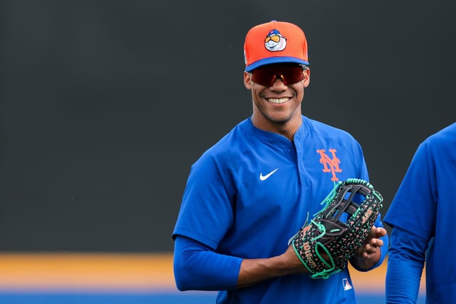 Feb 19, 2025; Port St. Lucie, FL, USA; New York Mets right fielder Juan Soto (22) looks on during a spring training workout at Clover Park. Mandatory Credit: Sam Navarro-Imagn Images/File Photo