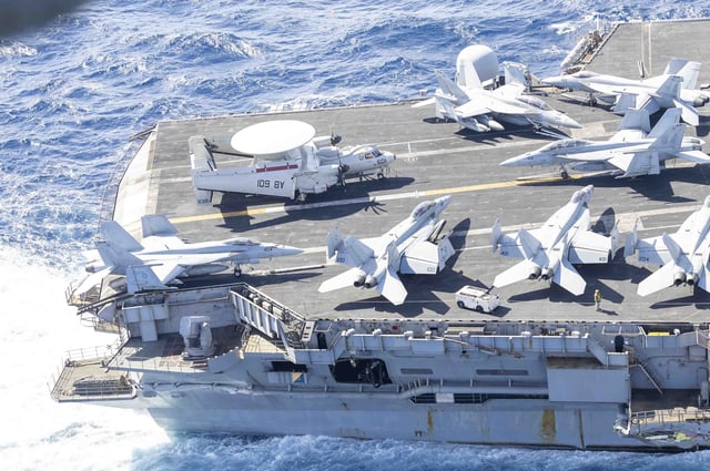 Exterior damage of USS Harry S. Truman viewed from an MH-60S Sea Hawk helicopter on Feb. 13, 2025, following a collision with the merchant vessel Besiktas-M near Port Said, Egypt. (U.S. Navy photo by Chief Mass Communication Specialist Jose Hernandez)