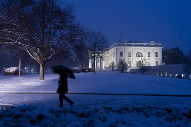FILE - The White House is seen as the snow falls, Feb. 11, 2025, in Washington. (Photo/Alex Brandon, File)
