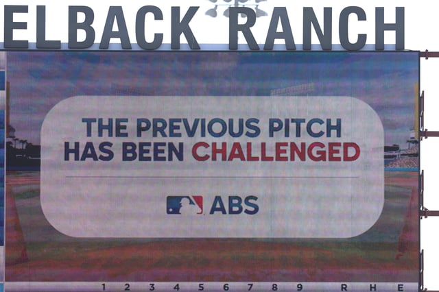 A detailed view of the scoreboard showing a pitch call being challenged during the Dodgers-Cubs game on Thursday.