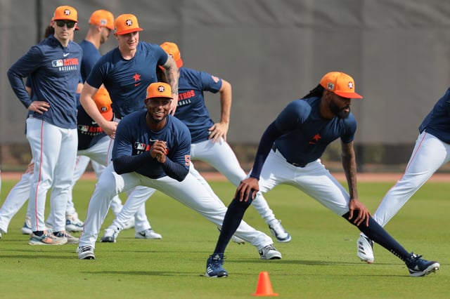 Feb 14, 2025; West Palm Beach, FL, USA; Houston Astros starting pitcher Ronel Blanco (56) stretches on the field during spring spring at CACTI Park of the Palm Beaches.