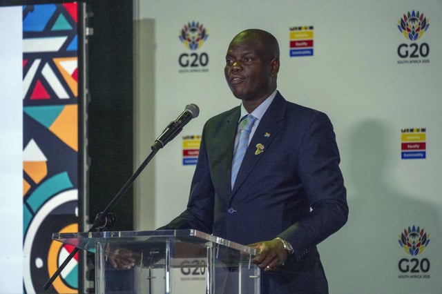 South African Minister of International Relations and Cooperation Ronald Lamola speaks with reporters after the G20 foreign ministers meeting in Johannesburg, South Africa, Friday, Feb. 21, 2025. (AP Photo/Jerome Delay)