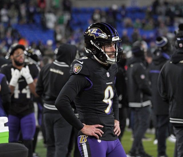 Ravens kicker stands dejectedly on the sideline as time is about to runs out in the game. Tucker missed two field goal attempts and an extra point in the game. The Eagles defeated the Ravens 24-19 at M&amp;T Bank Stadium. (Kenneth K. Lam/Staff)