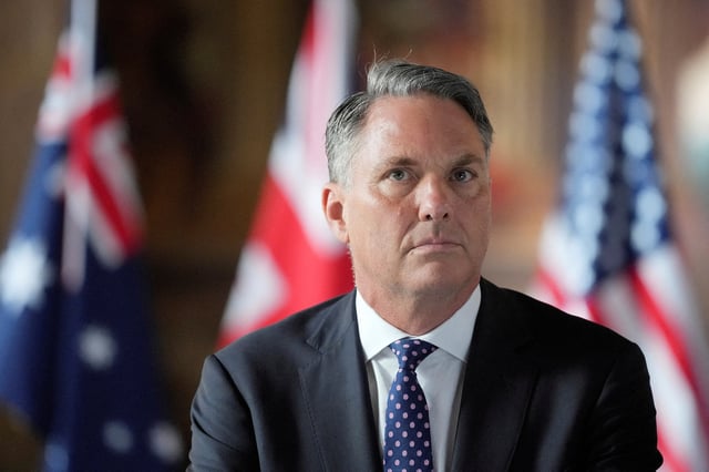 Australian Defense Minister Richard Marles listens during the AUKUS Defence Ministers Meeting at Old Royal Naval College, Greenwich, London, Thursday, Sept. 26, 2024.  Kin Cheung/Pool via REUTERS/File Photo