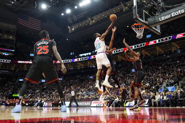 Feb 21, 2025; Toronto, Ontario, CAN; Miami Heat forward Andrew Wiggins (22) drives to the net against the Toronto Raptors during the first half at Scotiabank Arena. Mandatory Credit: Kevin Sousa-Imagn Images