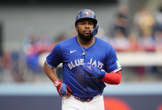TORONTO, ON - SEPTEMBER 29: Vladimir Guerrero Jr. #27 of Toronto Blue Jays looks on in break in play against the Miami Marlins in their MLB game at the Rogers Centre on September 29, 2024 in Toronto, Ontario, Canada.
