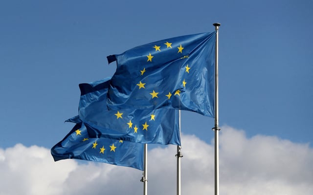 European Union flags fly outside the EU Commission headquarters in Brussels, Belgium September 19, 2019. REUTERS/Yves Herman/File Photo