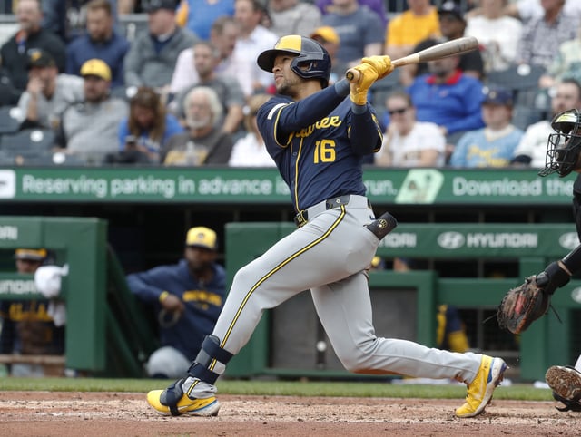 Sep 26, 2024; Pittsburgh, Pennsylvania, USA;  Milwaukee Brewers center fielder Blake Perkins (16) hits an RBI double against the Pittsburgh Pirates during the sixth inning at PNC Park. Mandatory Credit: Charles LeClaire-Imagn Images/File Photo