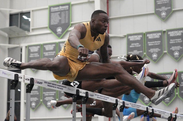 Feb 22, 2025; Staten Island, NY, USA; Grant Holloway wins the 60m hurdles in 7.36 during the USATF Indoor Championships at Ocean Breeze Athletic Complex. Mandatory Credit: Kirby Lee-Imagn Images