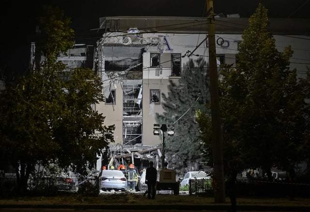 Rescuers work at a site of a Russian missile strike, amid Russia's attack on Ukraine, in Kryvyi Rih, Ukraine August 27, 2024. REUTERS/Stringer/File Photo