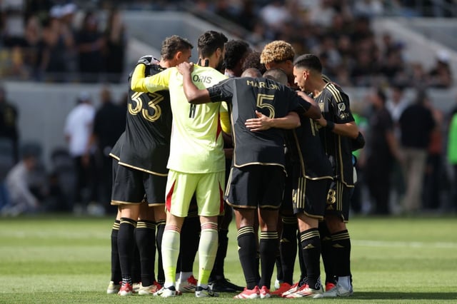 LAFC starting eleven huddle during the first half of an MLS match against the Minnesota United at BMO Stadium in Los Angeles, on Saturday, Feb. 22, 2025.  Los Angeles FC won 1-0.  (Photo by Raul Romero Jr., Contributing Photographer)