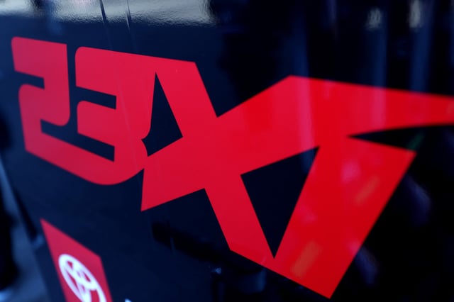 A detail view of the 23XI Racing logo in the garage area during practice for the NASCAR Cup Series Championship Race at Phoenix Raceway on November 08, 2024 in Avondale, Arizona.