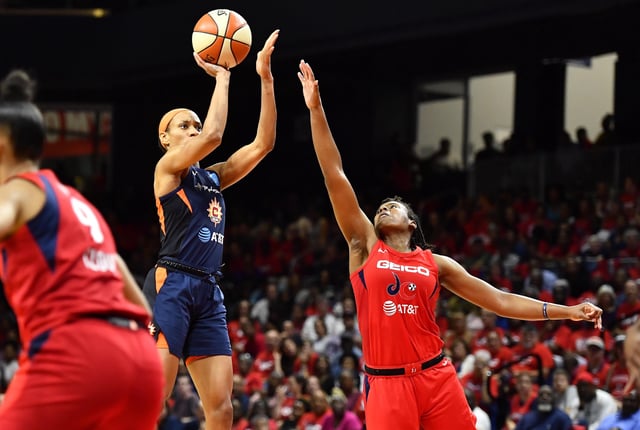 Oct 1, 2019; Washington, DC, USA; Connecticut Sun guard Jasmine Thomas (5) shoots over Washington Mystics guard Ariel Atkins (7) during the second half in game two of the 2019 WNBA Finals at The Entertainment and Sports Arena. Mandatory Credit: Brad Mills-USA TODAY Sports/File Photo