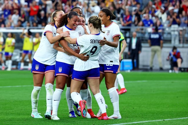 Feb 23, 2025; Glendale, Arizona, USA; USA forward Michelle Cooper (21) celebrates after scoring a goal during the second half against Australia in the SheBelieves Cup at State Farm Stadium. Mandatory Credit: Mark J. Rebilas-Imagn Images