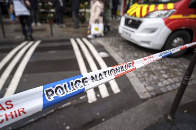 French police tape in Paris on December 23, 2022. This is not police tape from the scene of the baby&#39;s death.