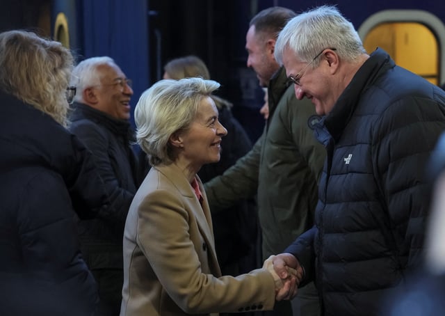 European Commission President Ursula von der Leyen meets with Ukraine's Foreign Minister Andrii Sybiha as she arrives at a central railway station of the Ukrainian capital, amid Russia's attack on Ukraine, in Kyiv, Ukraine February 24, 2025. REUTERS/Gleb Garanich