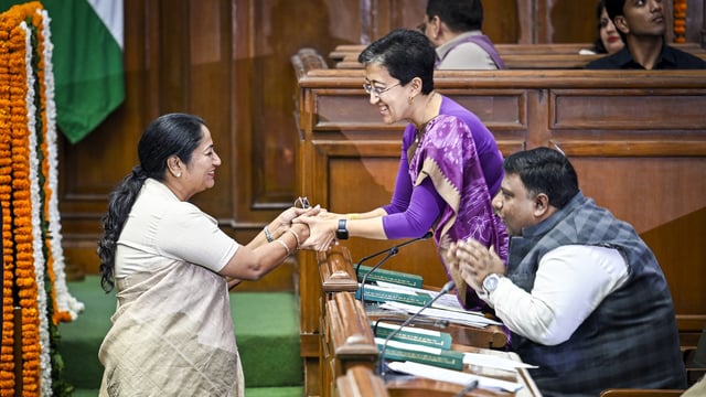Delhi chief minister Rekha Gupta with LOP Atishi in the assembly. (Photo by Raj K Raj/ Hindustan Times)
