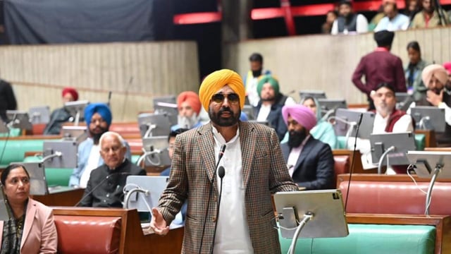 Chief minister Bhagwant Mann speaking on the resolution rejecting the Centre’s draft of the National Policy Framework on Agricultural Marketing in the Punjab Vidhan Sabha on Tuesday. (Ravi Kumar/HT)