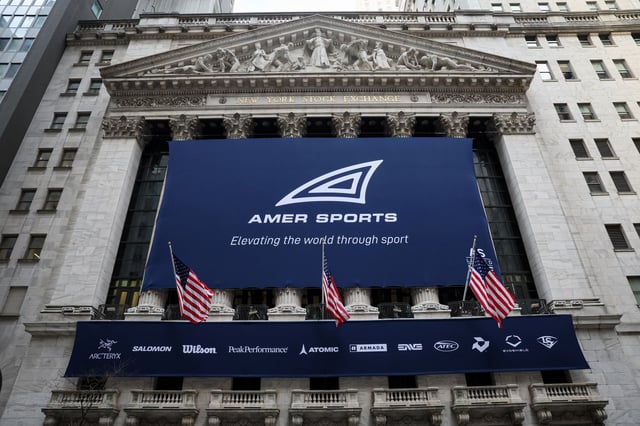 Amer Sports, (AS.N) parent company of sporting goods brands, banner hangs on the front of the New York Stock Exchange (NYSE) during the company's IPO in New York City, U.S., February 1, 2024.  REUTERS/Brendan McDermid/File Photo