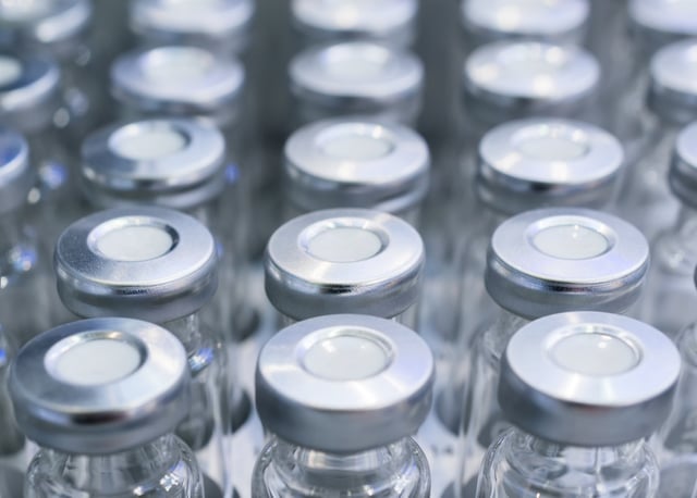 Glass vials for liquid samples. Shallow depth of field.