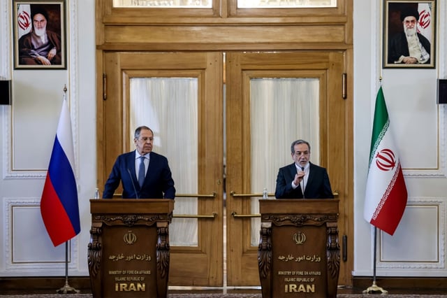 Iran's Foreign Minister Abbas Araghchi (R) ruled out direct nuclear talks with the US during a visit by his Russian counterpart Sergei Lavrov