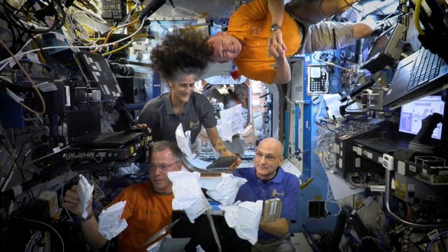 FILE PHOTO: NASA astronauts Sunita Williams, Nick Hague, Barry Wilmore, and Donald Pettit unbox Thanksgiving meals, from the International Space Station (ISS), in this screen grab taken from a handout video, released on November 26, 2024.