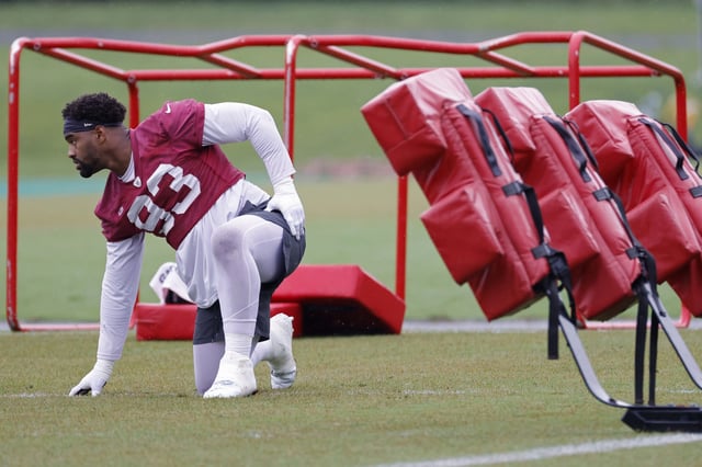 May 24, 2022; Asburn, VA, USA; Washington Commanders defensive tackle Jonathan Allen (93) warms up before drills as part of OTAs at The Park in Ashburn. Mandatory Credit: Geoff Burke-USA TODAY Sports/File Photo