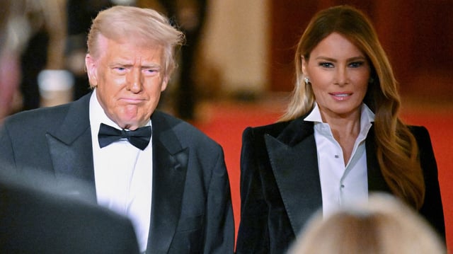 US President Donald Trump and US First Lady Melania Trump arrive for the National Governors Association Evening Dinner and Reception on Feb. 22, 2025.