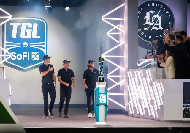 Justin Rose, left, Collin Morikawa, center, and Tommy Fleetwood of the Los Angeles Golf Club are introduced before their TGL match at SoFi Center.
