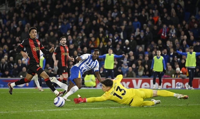 Soccer Football - Premier League - Brighton & Hove Albion v AFC Bournemouth - The American Express Community Stadium, Brighton, Britain - February 25, 2025 Brighton & Hove Albion's Danny Welbeck scores their second goal past AFC Bournemouth's Kepa Arrizabalaga REUTERS/Tony O Brien