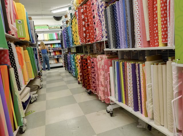 A customer shops in a JOANN Fabric and Crafts store slated to close on February 13, 2025 in Miami, Florida.