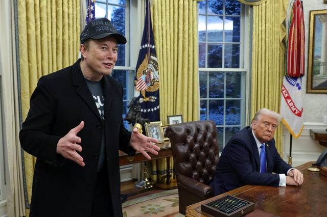 Elon Musk speaks next to U.S. President Donald Trump in the Oval Office of the White House in Washington, D.C., U.S., February 11, 2025.   REUTERS/Kevin Lamarque/File Photo