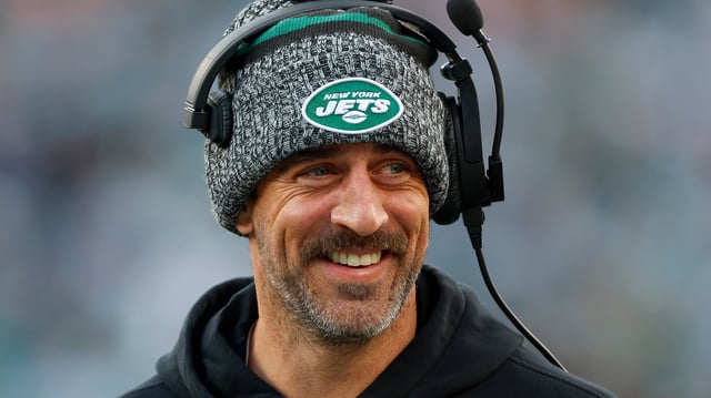Aaron Rodgers #8 of the New York Jets looks on from the sideline prior to the game against the Miami Dolphins at MetLife Stadium on November 24, 2023 in East Rutherford, New Jersey.