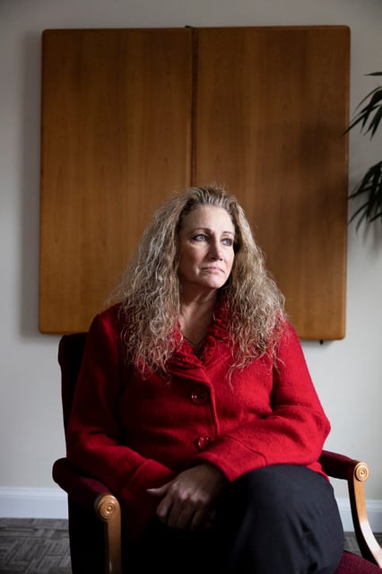 Marlean Ames sits for a portrait at the law office of Edward Gilbert, her lawyer, in Akron, Ohio, U.S. February 13, 2025.