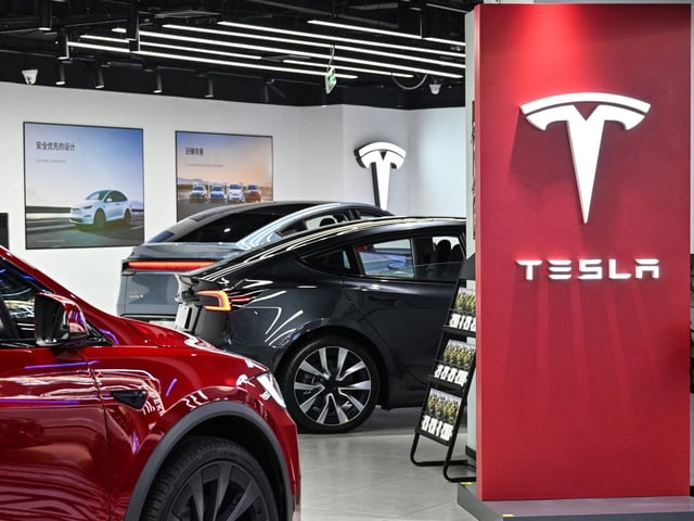 Tesla rolled out self-driving features to some of its cars in China on Tuesday.