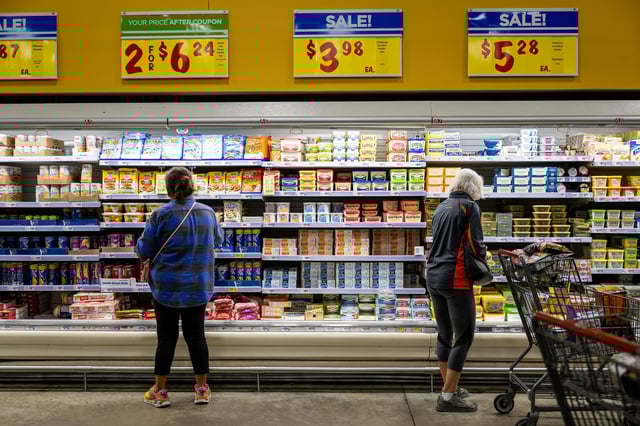 Customers shop for produce at an H-E-B grocery store on February 12 in Austin, Texas.