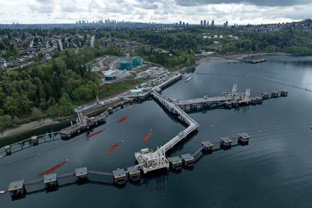 A drone view of three berths able to load vessels with oil is seen after their construction at Westridge Marine Terminal, the terminus of the Canadian government-owned Trans Mountain pipeline expansion project in Burnaby, British Columbia, Canada, April 26, 2024. REUTERS/Chris Helgren/File Photo