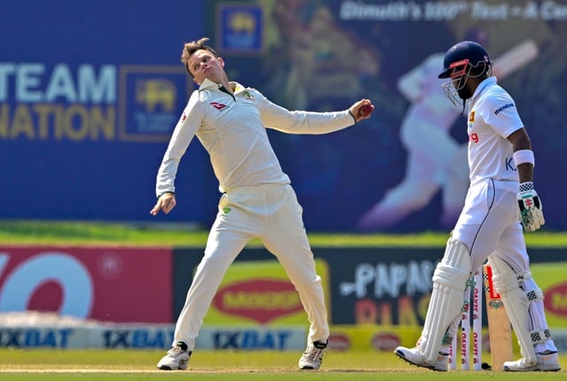 Australia's Matthew Kuhnemann (L) took 16 wickets in the series win over Sri Lanka which resulted in his action being reported
