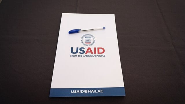 Paper that says 'USAID'
