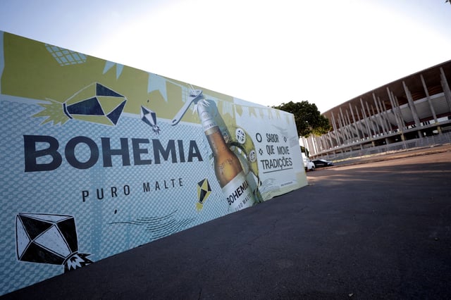 A booth of Bohemia beer produced by Brazil-based Ambev, is mounted in front of the stadium of the Mane Garrincha National Stadium in Brasilia, Brazil June 9, 2021. REUTERS/Ueslei Marcelino/File Photo