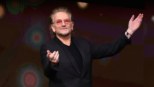 BERLIN, GERMANY - FEBRUARY 21: U2 singer and frontman Bono  speaks on stage at the "The Fabelmans" (Die Fabelmans) premiere  & Honorary Golden Bear and homage for Steven Spielberg during the 73rd Berlinale International Film Festival Berlin at Berlinale Palast on February 21, 2023 in Berlin, Germany. (Photo by Andreas Rentz/Getty Images)